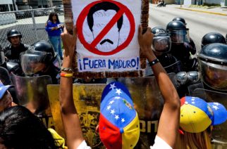 People demonstrate against President Nicolas Maduro, in Merida, Venezuela, on September 7, 2016 as the country's opposition called for new nationwide protests to pressure for a referendum on removing him from power by the end of the year.

Venezuela's opposition is holding nationwide protests against Maduro, testing his grip on power six days after massive demonstrations showed the magnitude of anger over a raging crisis. The leftist leader has called his own supporters to hold rallies across the country, seeking to show his strength in the face of opposition pressure. / AFP / FEDERICO PARRA        (Photo credit should read FEDERICO PARRA/AFP/Getty Images)